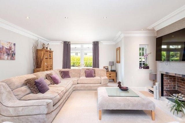 Completing the accommodation on the ground floor is a cosy, full length living room with French doors to the rear garden, an office and a fabulous sun room with full height windows and a glass ceiling.