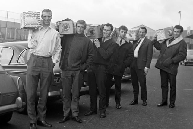 Leeds players including Jack Charlton and Paul Reaney find time to deliver Christmas turkeys in December 1966.