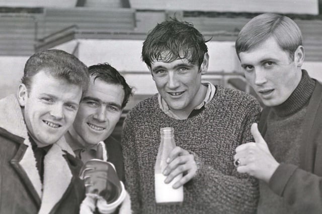 Players including Billy Bremner and Norman Hunter give the thumbs up after being drawn against Crystal Palace in the third round of the FA Cup at Elland Road,