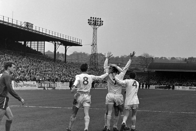 Peter Lorimer is mobbed by teammates after scoring the only goal of the game against Chelsea at Elland Road in April 1967.