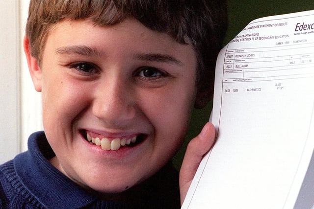 Adam Bull, 12,  celebrates his A* GCSE Maths result in August 1999. The Year 7 Roundhay School pupil took his GCSE maths exam four years early.