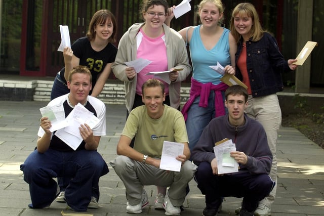 Pupils at Garforth Community College celebrate their GCSE results in August 2001.