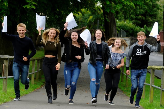 Three of the five sets of twins celebrate success at Benton Park School on GCSE results day in August 2015.