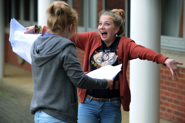 Amy Joynes and Rina Fiterman celebrate their GCSE results at Brigshaw High in August 2012.