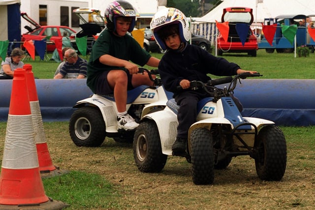 The race was on for these two boys pictured at the Leeds Show enjoying the fun of the Quad Bikes.