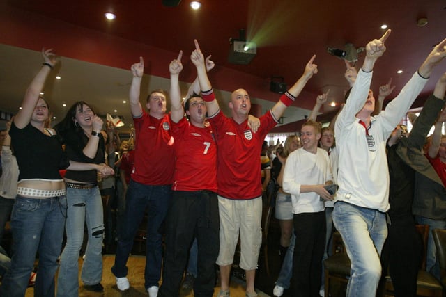 England fans celebrating in Halifax town centre pubs in 2004
