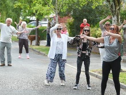 Residents of Highgate, Penwortham doing their daily dance to Sweet Caroline by Neil Diamond