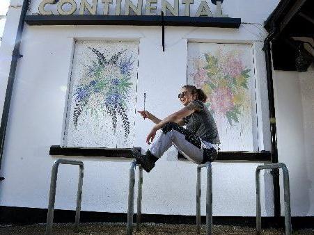 Painter and Decorator/ Fine Arts student Hannah Browne has painted murals on the side of The Continental pub in Preston that have become incredibly popular with people in Avenham