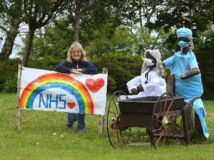 Christine Graham from Freckleton in Bloom with the tribute to the NHS on the roundabout at Freckleton