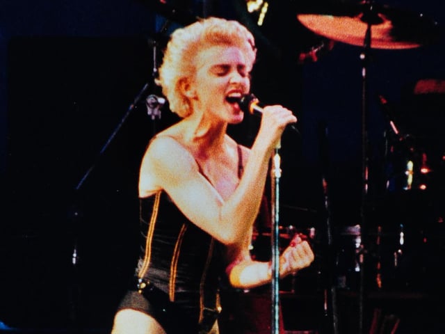“I’m really cold up here, it is windy and it might rain. Wait a second though, I want you guys to keep me warm and keep each other warm,” said Madonna on stage.