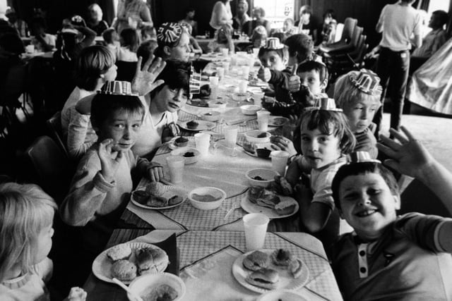 Food for thought as youngsters of Bayswater Avenue in Harehills tuck into their party feast.