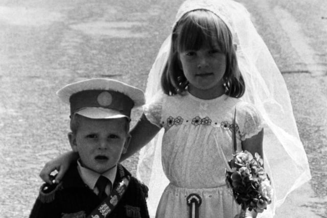 Royal couple... that's two-year-old Matthew Smart and sister Emma, five, at a party on Cross Park Street.