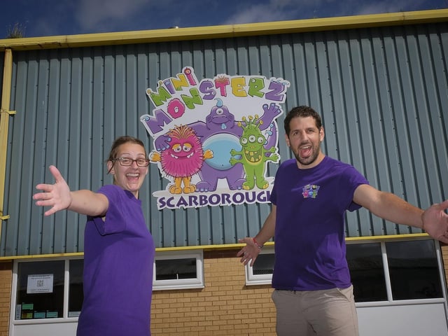 Staff Sarah Waterfield and Jonny Plant welcome customer