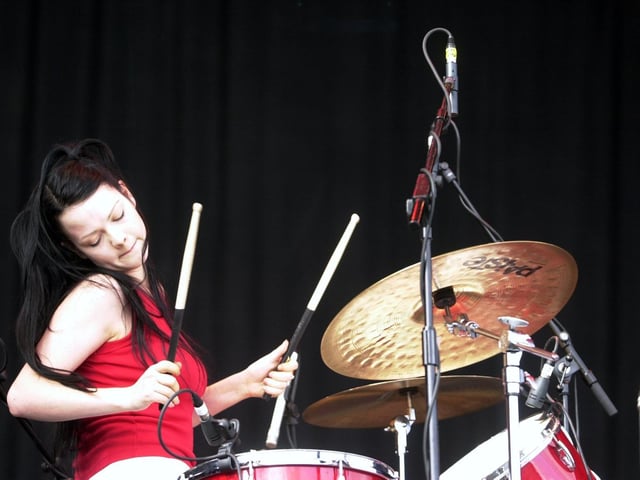 Meg White, of The White Stripes on the main stage in August 2002. Photo: Gerard Binks