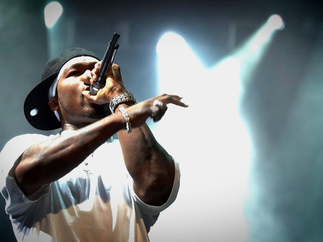 50 Cent on stage at the Leeds Festival in 2004. Photo: Simon Hulme