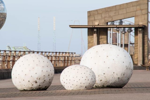 Glam Rocks installed in June 2001 consists of three large pebbles with constellations of hundreds of fibre optic lights which slowly change colour and sparkle.