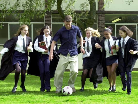 Pupils from Southlands High School, Chorley, who competed in the Magistrates Mock Trial Competition try out their football skills with Bolton Wanderers player Gudni Bergsson who is also a qualified lawyer