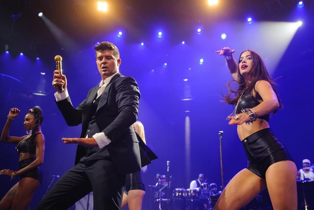 Robin Thicke feat TI and Pharrell - Blurred Lines

Incredibly catchy but dubious lyrically.