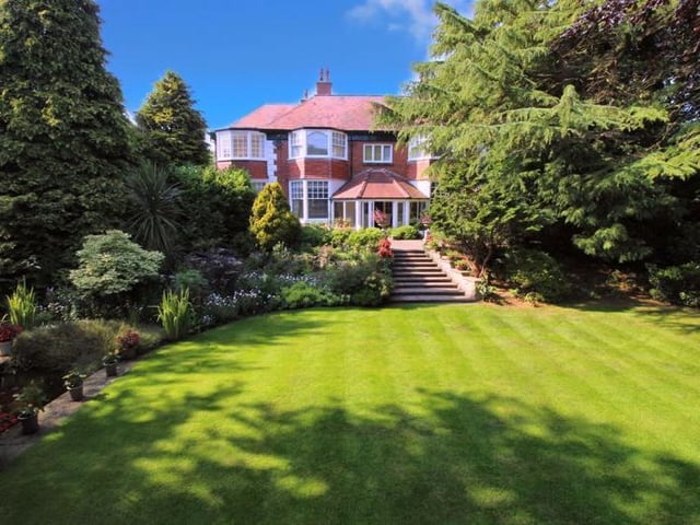 This house has extensive and well maintained private grounds.