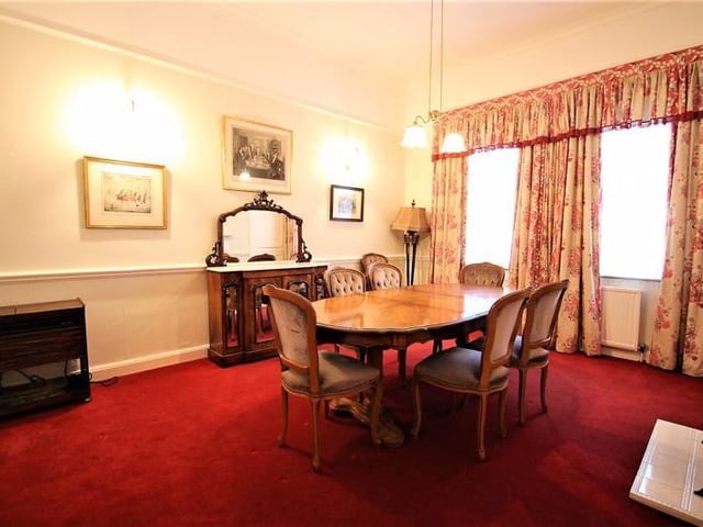 Dining room with stairs to the first floor.