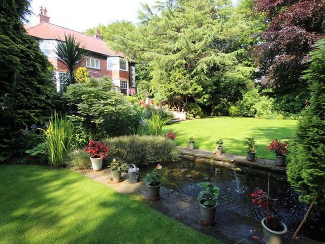Pond feature and mature planted aspects.