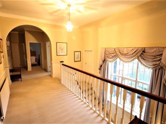 First floor landing area leads into five double bedrooms.