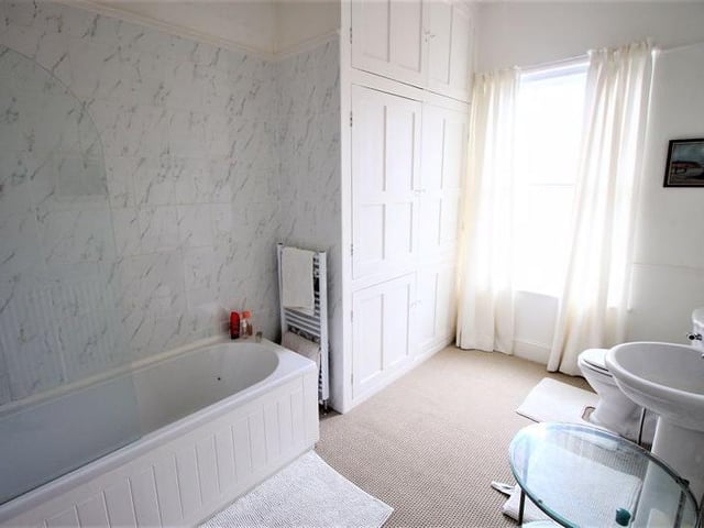 Three piece suite house bathroom and a separate WC.