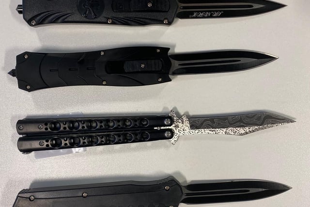 Police seized these flick knives from a home in Preston in December 2019. Police visited the home after a number of weapons, including a training sword, baton and another flick knife, were intercepted in the post