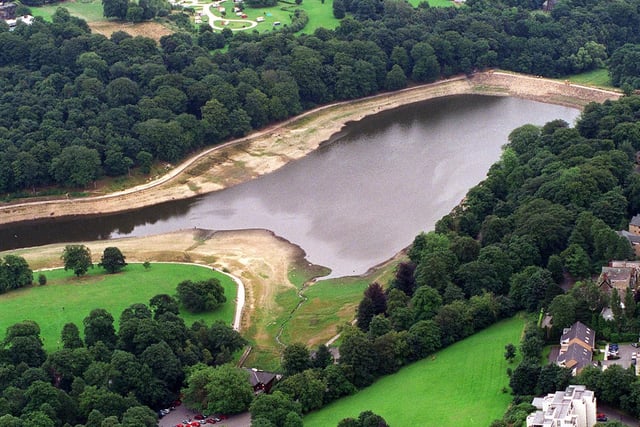 An aerial picture of Roundhay Park Lake showing low water levels.