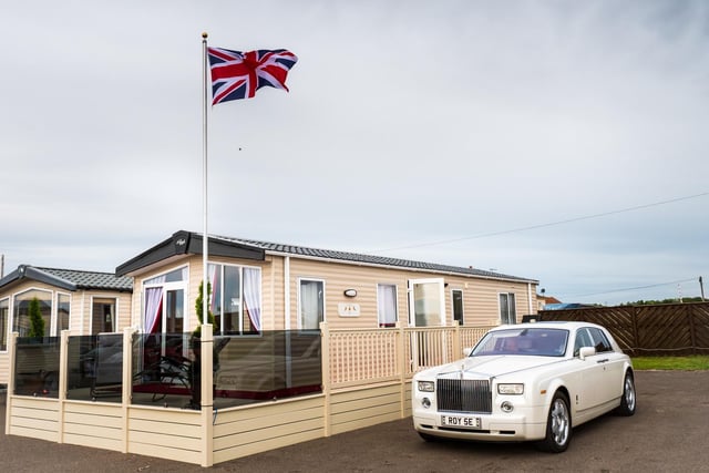 The static caravan flies the British flag proudly at its home in Cayton Bay.