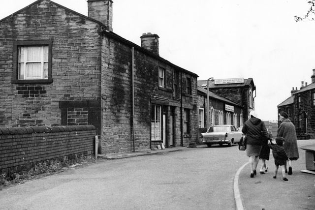August 1968 and this is Troy Road and beyond the premises of James Dolman and Co Ltd, gasket and joint manufacturers. Two women and two children walk along the street in the foreground.