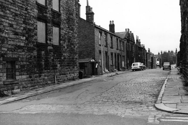 August 1968 and New Street is in view looking from Wesley Street. The original cobbled street has been tarmaced and repaired in places.