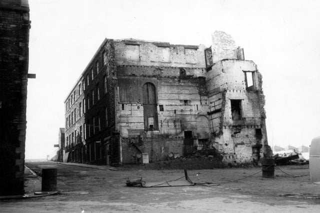 Albert Mills on Wellington Street showing damage after a fire in August 1961.
