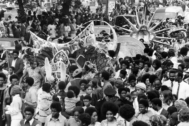Led by their Carnival Queen, Movva Pinnock, 19, from Huddersfield, the  Carnival procession makes its way down Chapeltown Road in 1973.
