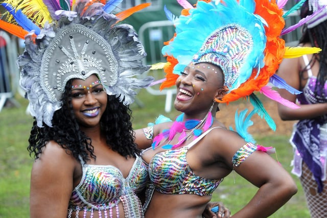 Kim Weekes (left) and Jasmine Prophet share a joke at the carnival in August 2015.