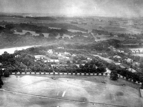 Looking south east across Soldiers' Field. West Avenue runs from left to right with Waterloo Lake on the left. Tennis courts are just visible on the bottom right.