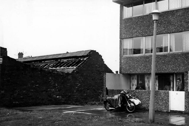 September 1974 and Pottery Vale flats on the right, with no. 6 on the ground floor. To the left is a derelict warehouse which faces onto Cariss Street.