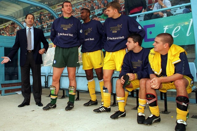 New Leeds United manager George Graham with his players in the dugout against Coventry City.
