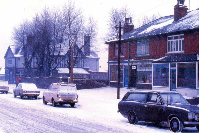 A snowy scene from February 1969. Verity's newsagents is the centre of this photo but hat was the name of the fish and chip shop to the left?