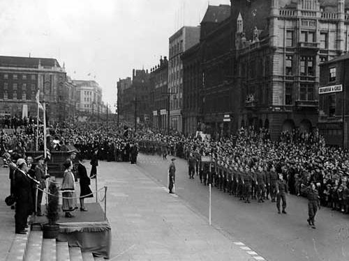 The Duchess of Kent taking the salute at a march past of youth organisations on The Headrow in November 1943.