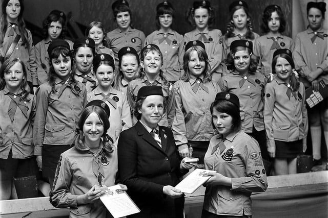Wigan Girl Guides receive their Queen's Guide awards in 1972