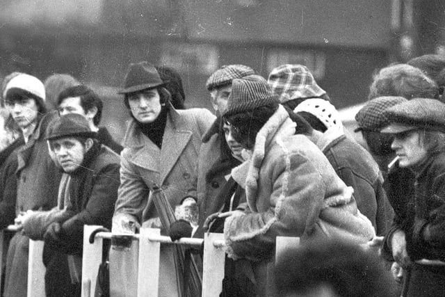 Fans enjoy at match at Wigan Rugby Union club in 1974