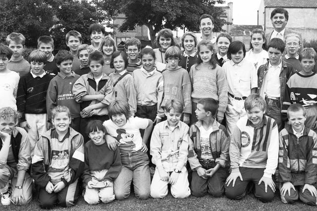 Pupils at Lamberhead Junior School Pemberton welcome friends from Wigan's twin town Angers, France in 1990.