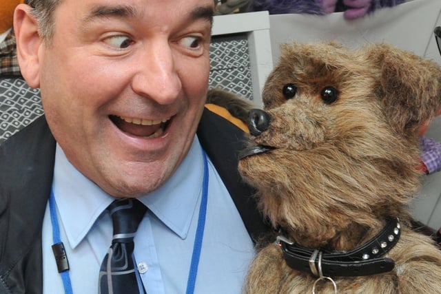 News editor Charles Graham is delighted to meet TV celebrity, Hacker T Dog, during an interview with Wiganer Phil Fletcher, puppeteer, puppet maker and the creator of CBBC puppet Hacker T Dog.