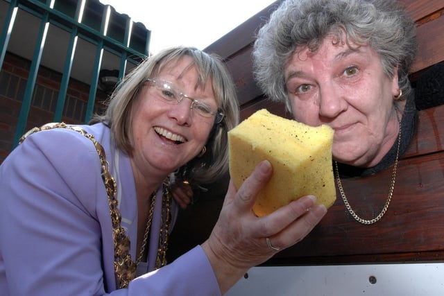 Event organiser Barbera Nettleton, right, recieves a soaking from the Mayor of Wigan Coun Eunice Smethurst during the Scholes Precinct Funday 2007.