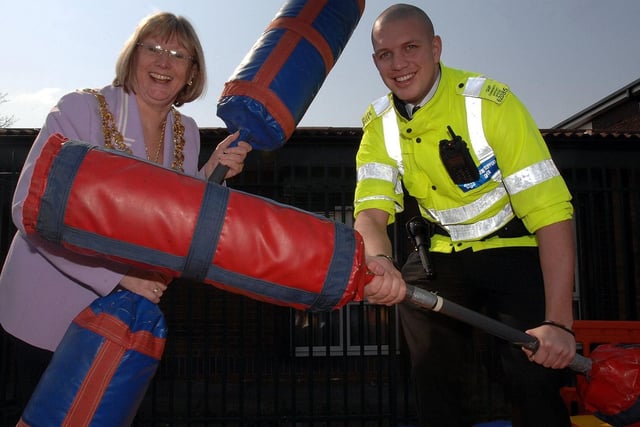 The Mayor of Wigan Coun Eunice Smethurst trades blows with PCSO at the Scholes Precinct Funday, 2007.