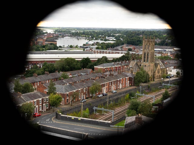 Looking out through the peepholes towards the Docklands.