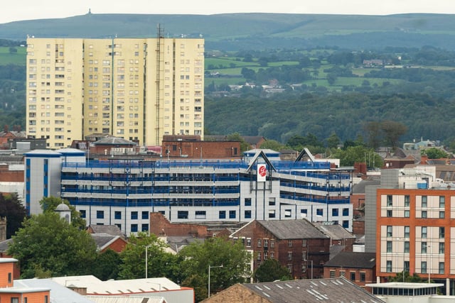 Darwen Tower can be seen in the background on a clear day with St George's Centre car park in the foreground.