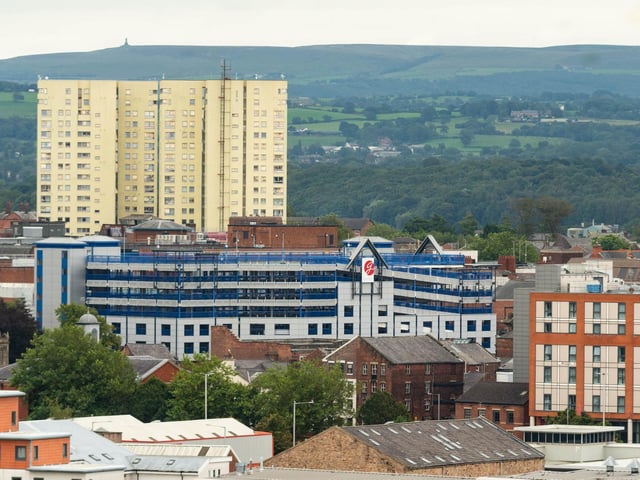 Darwen Tower can be seen in the background on a clear day with St George's Centre car park in the foreground.