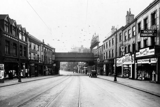 View looking down on to Lower Briggate under Railway Bridge in direction of Leeds Bridge. Junction with Swinegate can be seen on right.